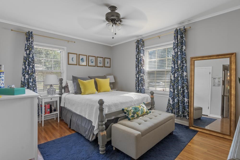 5218 Quince Road Memphis, TN 38117 - Photo 14 of 25 a bedroom with a bed couch and window