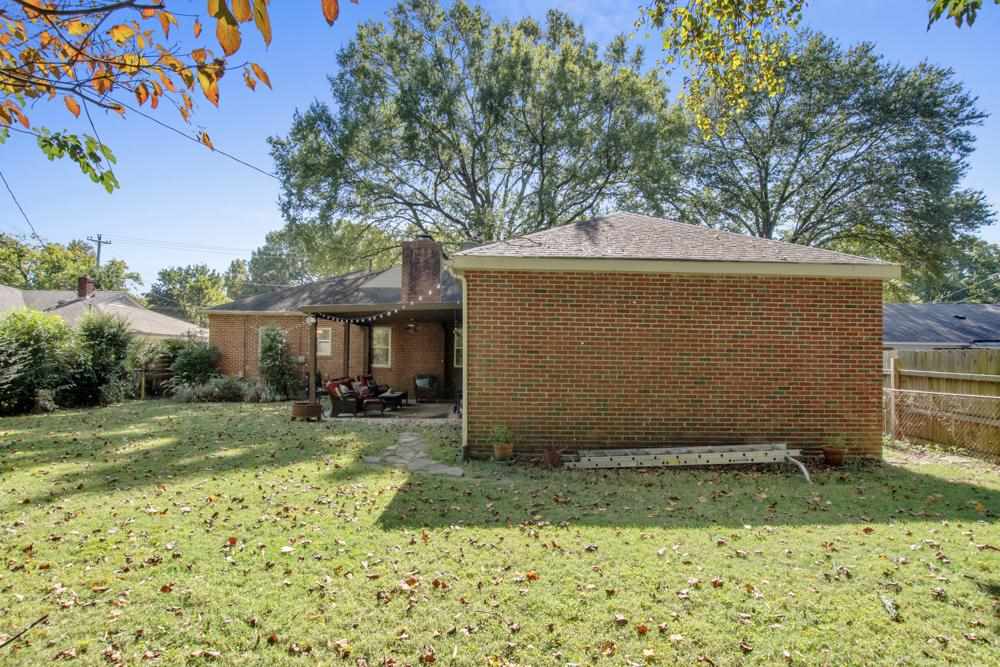 5218 Quince Road Memphis, TN 38117 - Photo 23 of 25 a view of a house with backyard