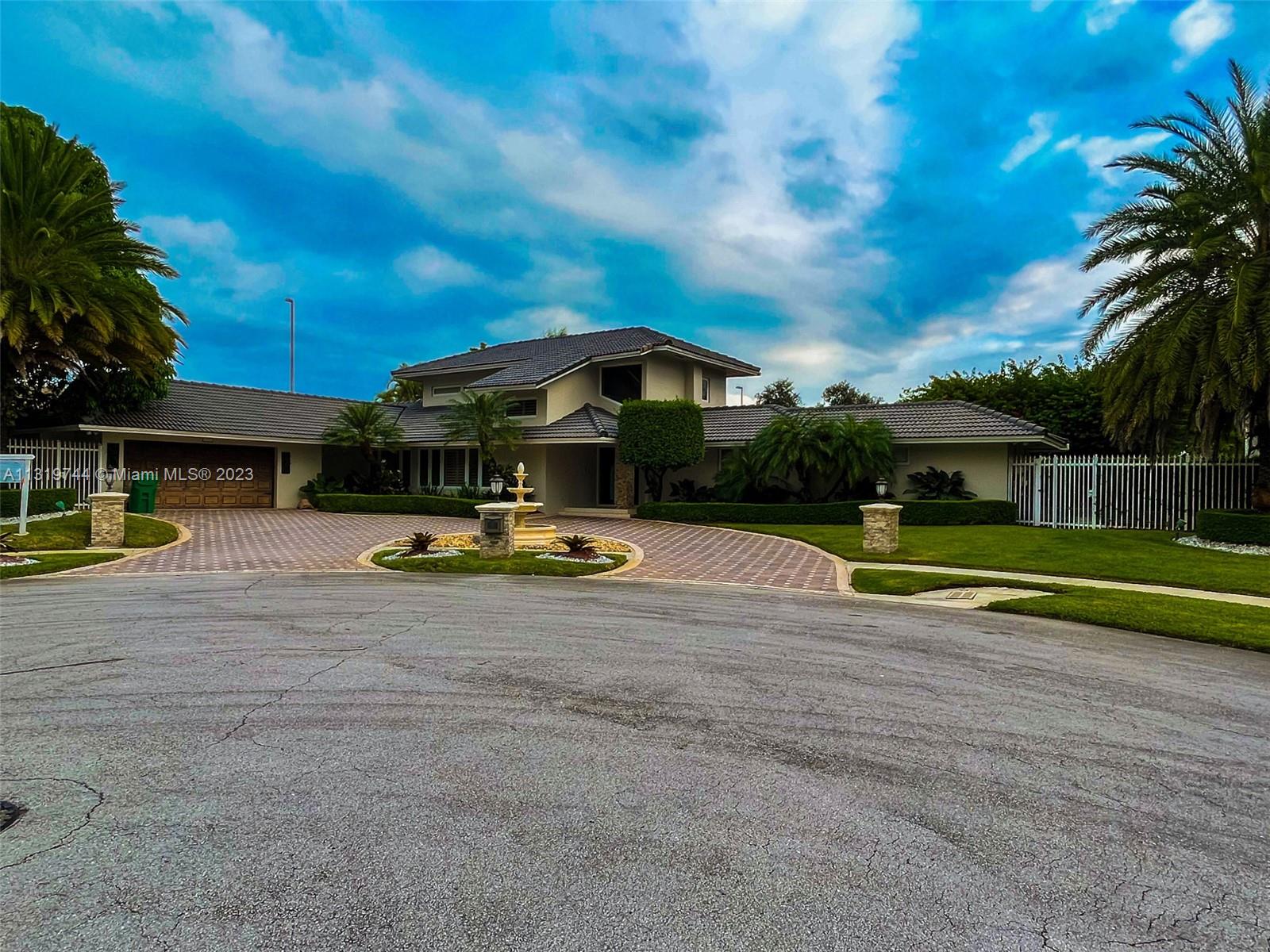 11990 Southwest 92nd Street Miami, FL 33186 - Photo 30 of 33 a view of a swimming pool with a yard