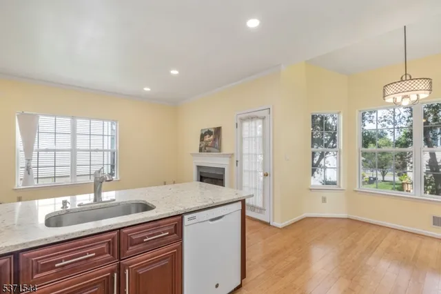 a kitchen with sink and window