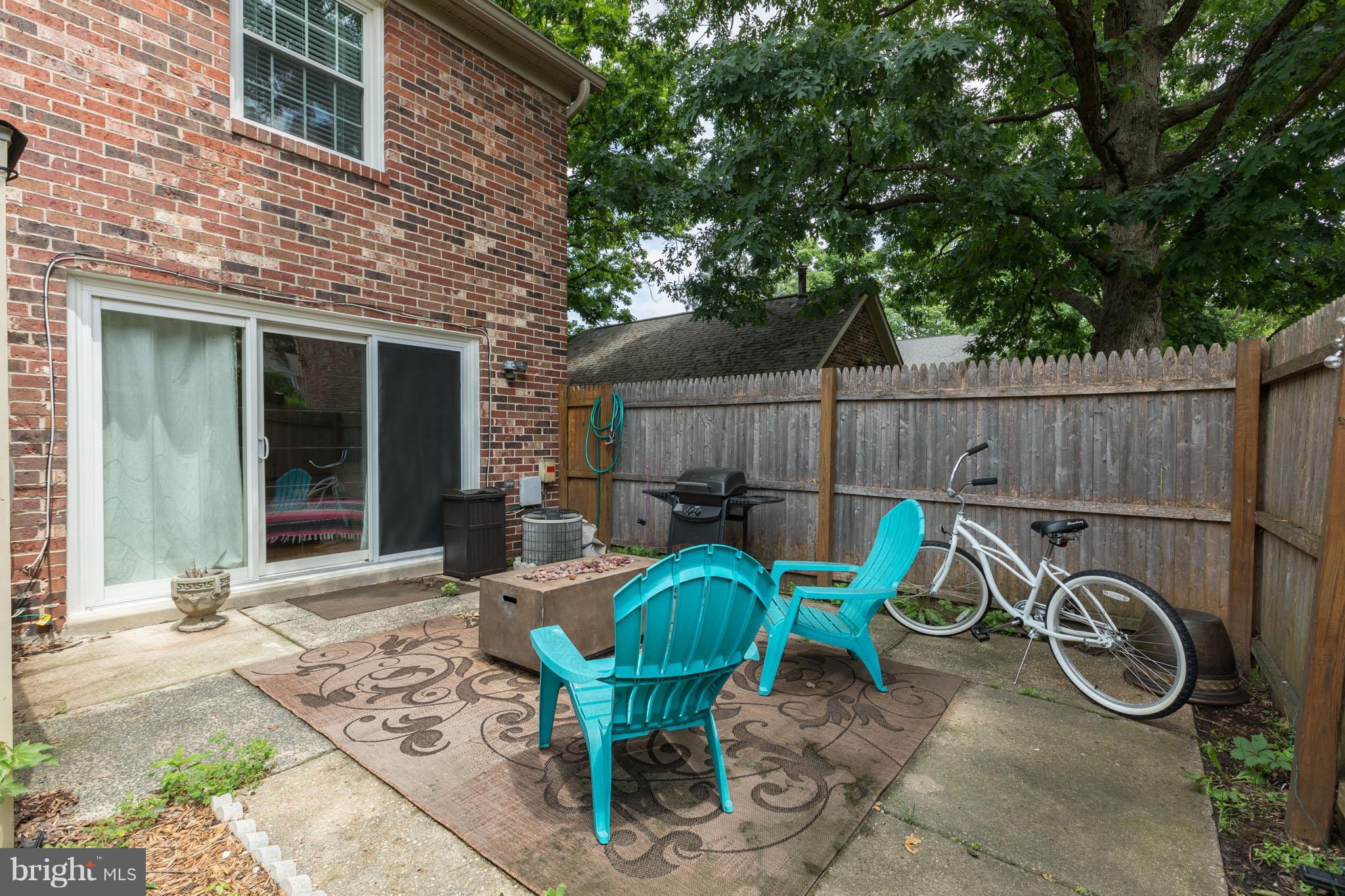8355 Dunham Court, Unit 607 Springfield, VA 22152 - Photo 15 of 15 a view of a chairs with two chairs in a patio