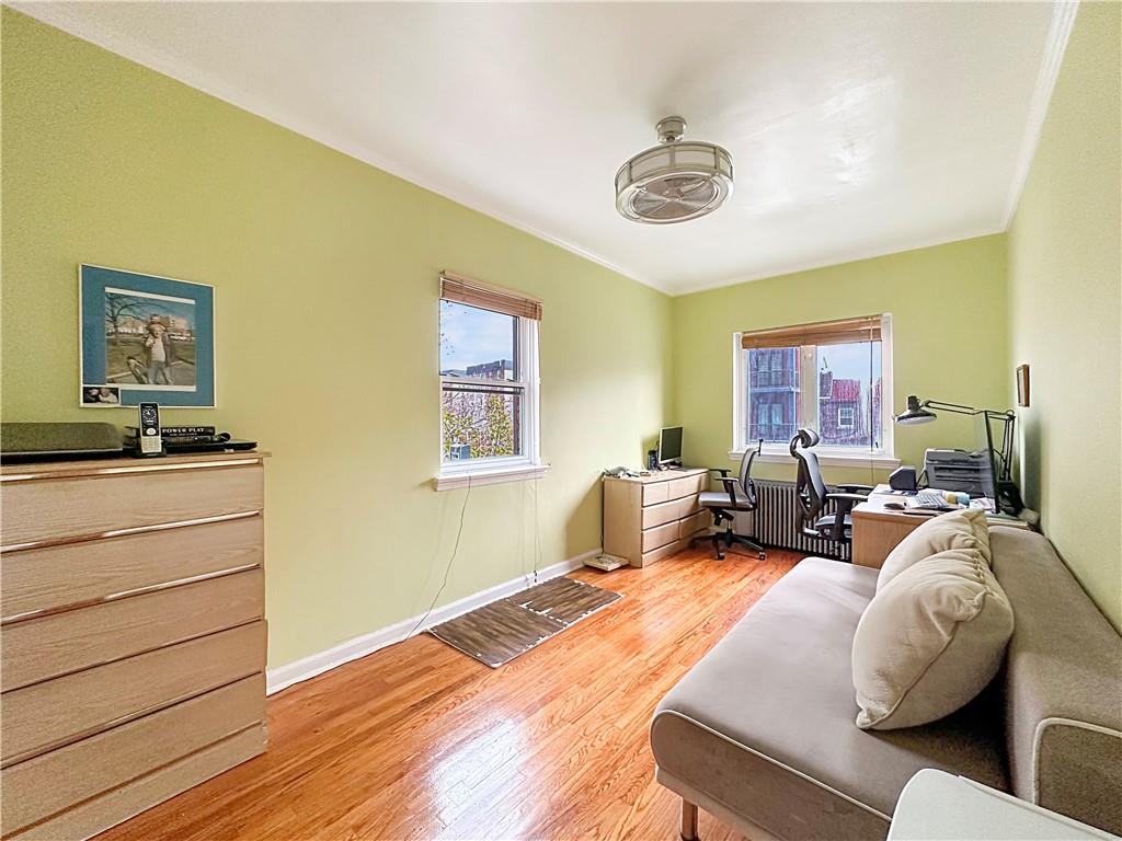 18 Corbin Place Brooklyn, NY 11235 - Photo 11 of 22 a living room with furniture and a large window