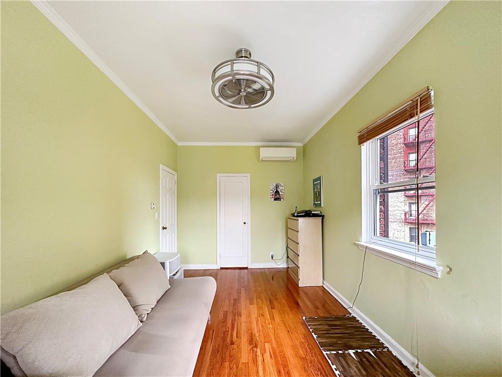 18 Corbin Place Brooklyn, NY 11235 - Photo 15 of 22 a bedroom with a bed and a window