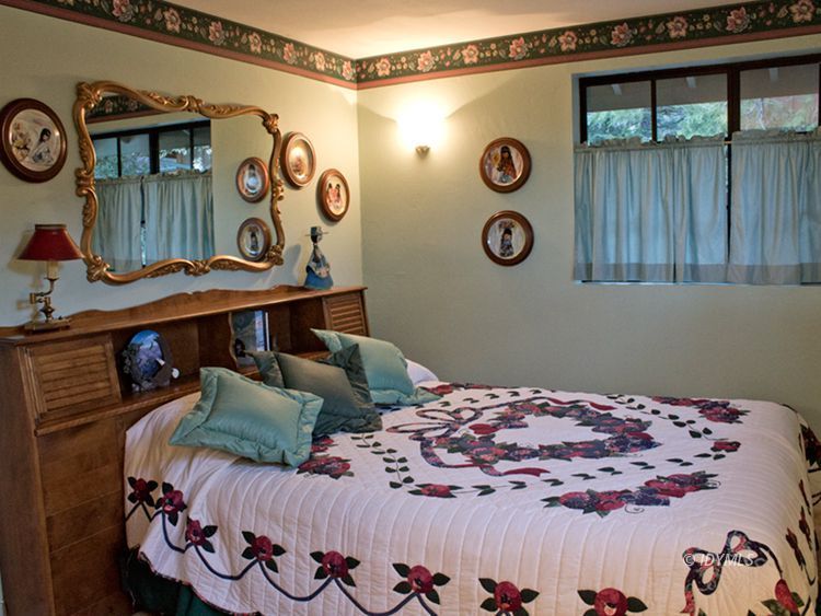 55870 Encino Road Idyllwild, CA 92549 - Photo 17 of 29 a bedroom with a bed and a window