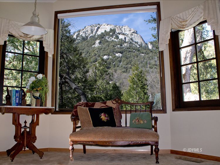 55870 Encino Road Idyllwild, CA 92549 - Photo 5 of 29 a view of a chairs and table in a room