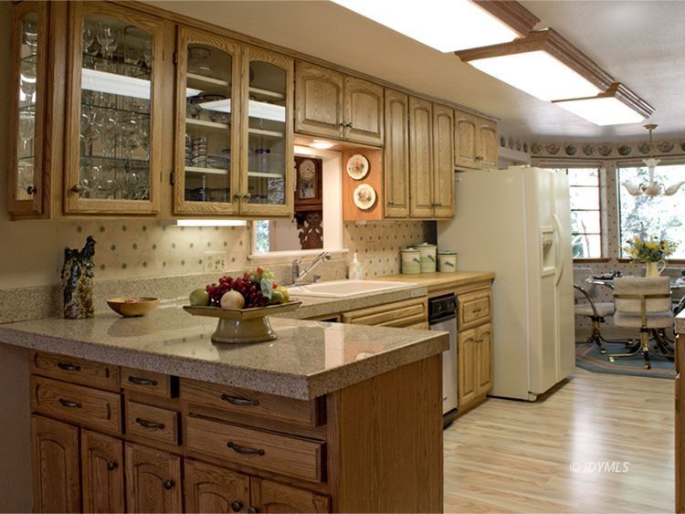 55870 Encino Road Idyllwild, CA 92549 - Photo 7 of 29 a kitchen with a sink cabinets and wooden floor