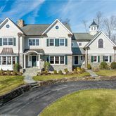 a front view of a house with swimming pool