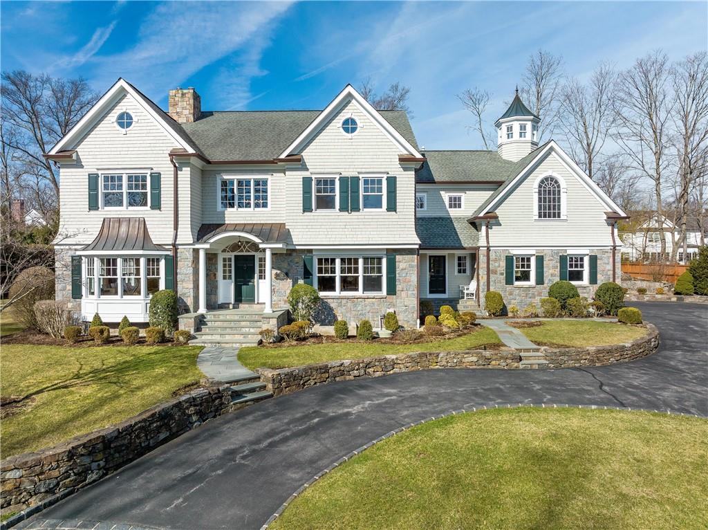 a front view of a house with swimming pool