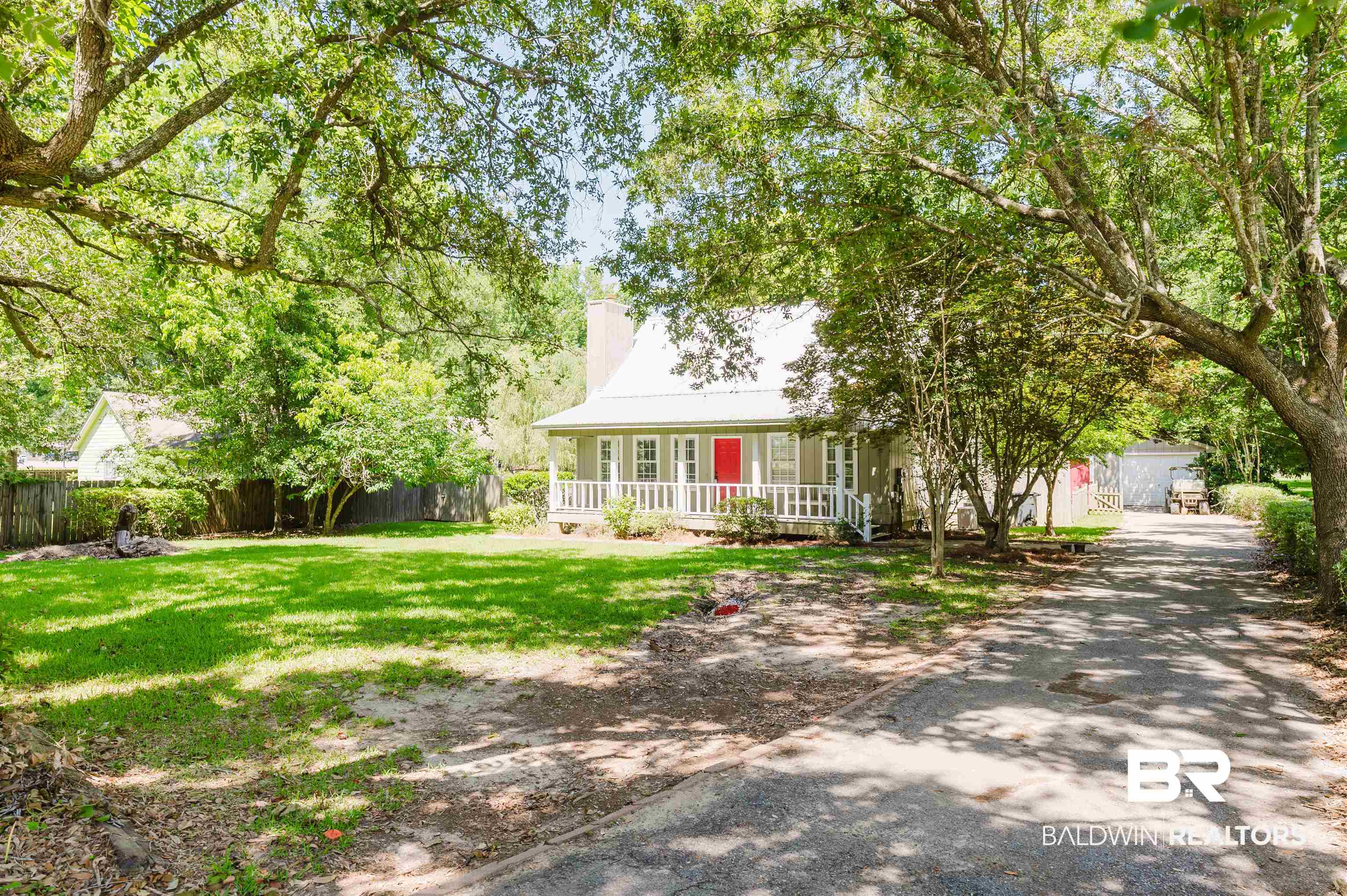 20460 Bishop Road Fairhope, AL 36532 - Photo 2 of 41 View of front of property with covered porch and a chimney