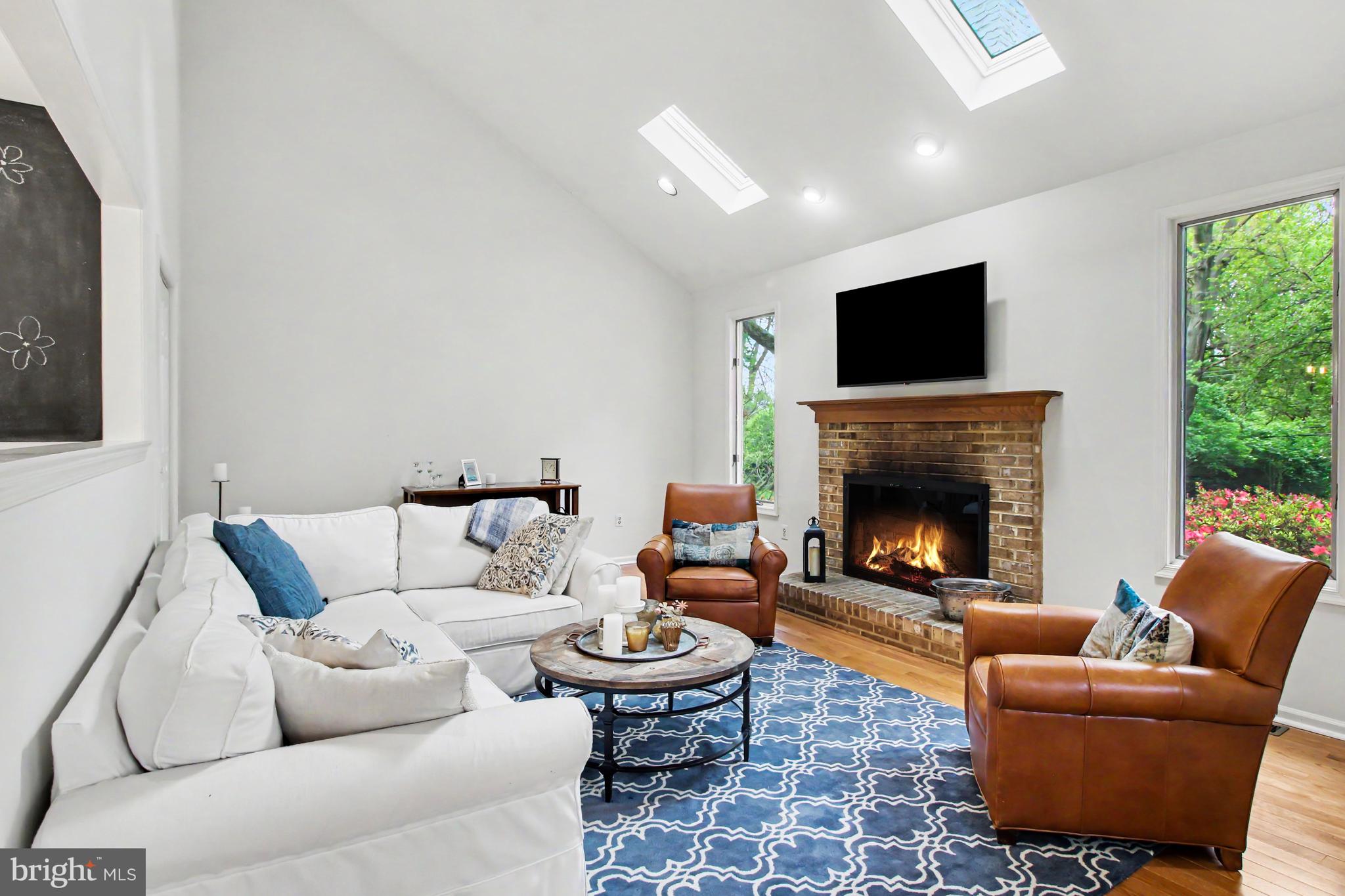 1606 Buttonwood Road Flourtown, PA 19031 - Photo 17 of 44 Step Down Fireplace with Skylights