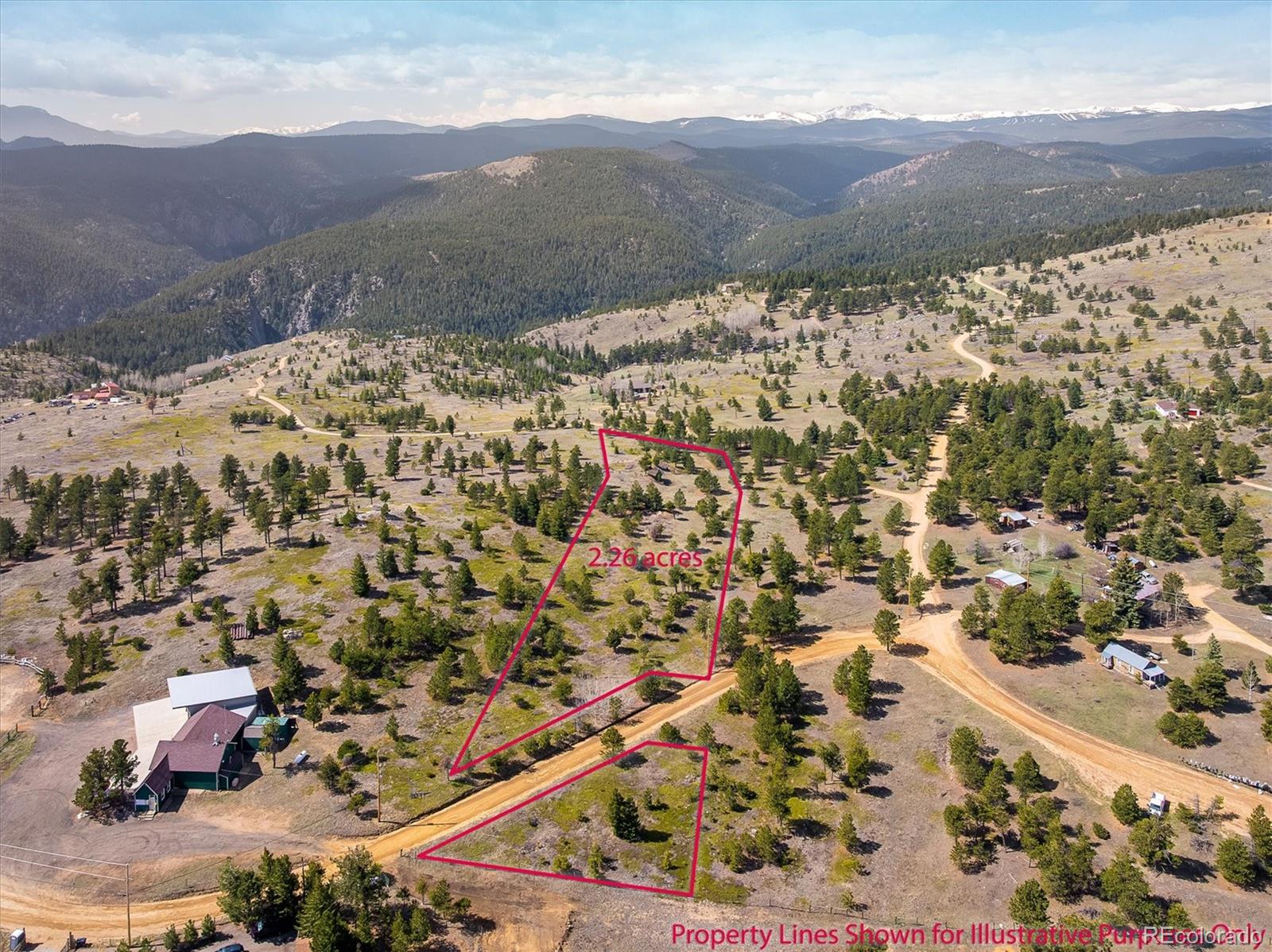 1713 Lost Angel Road Boulder, CO 80302 - Photo 1 of 23 a view of a backyard with a mountain