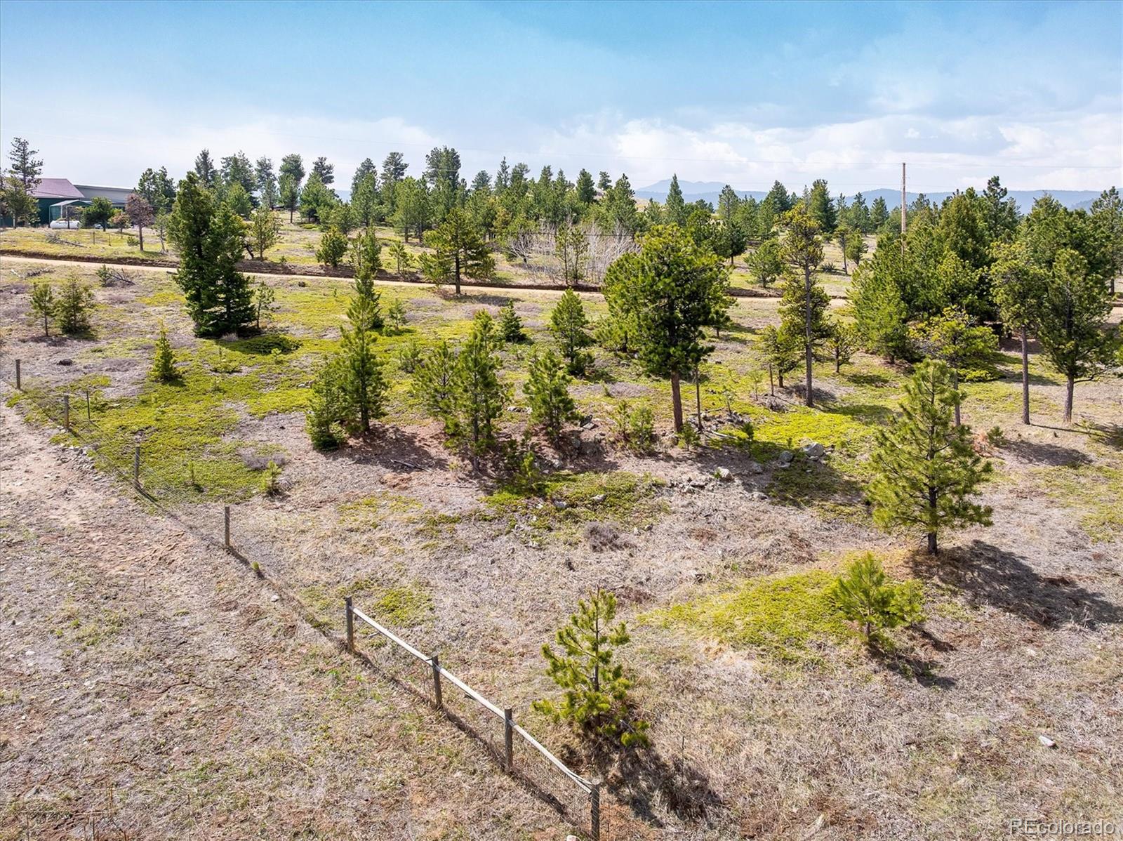 1713 Lost Angel Road Boulder, CO 80302 - Photo 6 of 23 a view of a yard with wooden fence