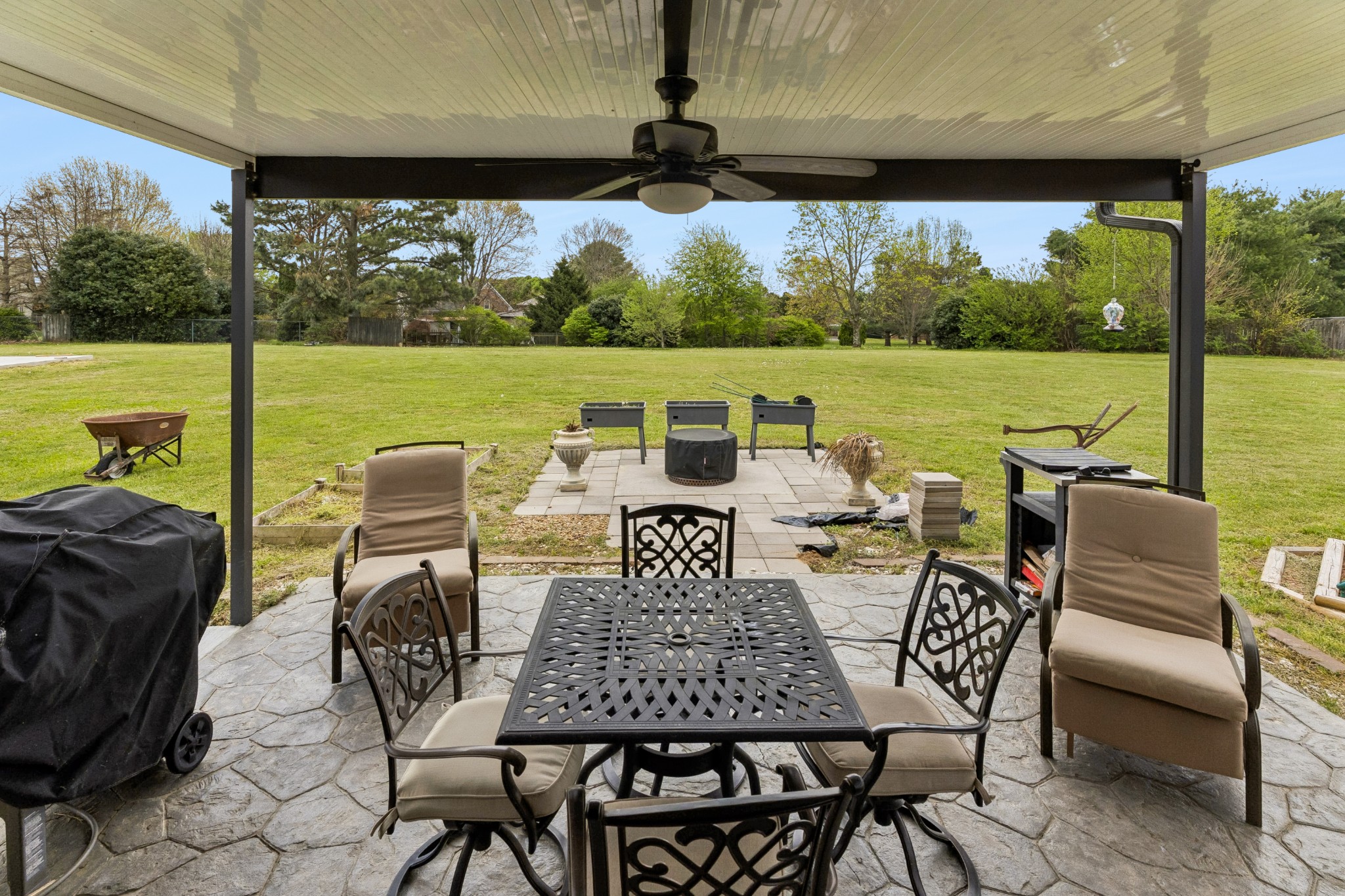 2028 Mason Lane Spring Hill, TN 37174 - Photo 24 of 25 a view of a patio with a table chairs and a swimming pool