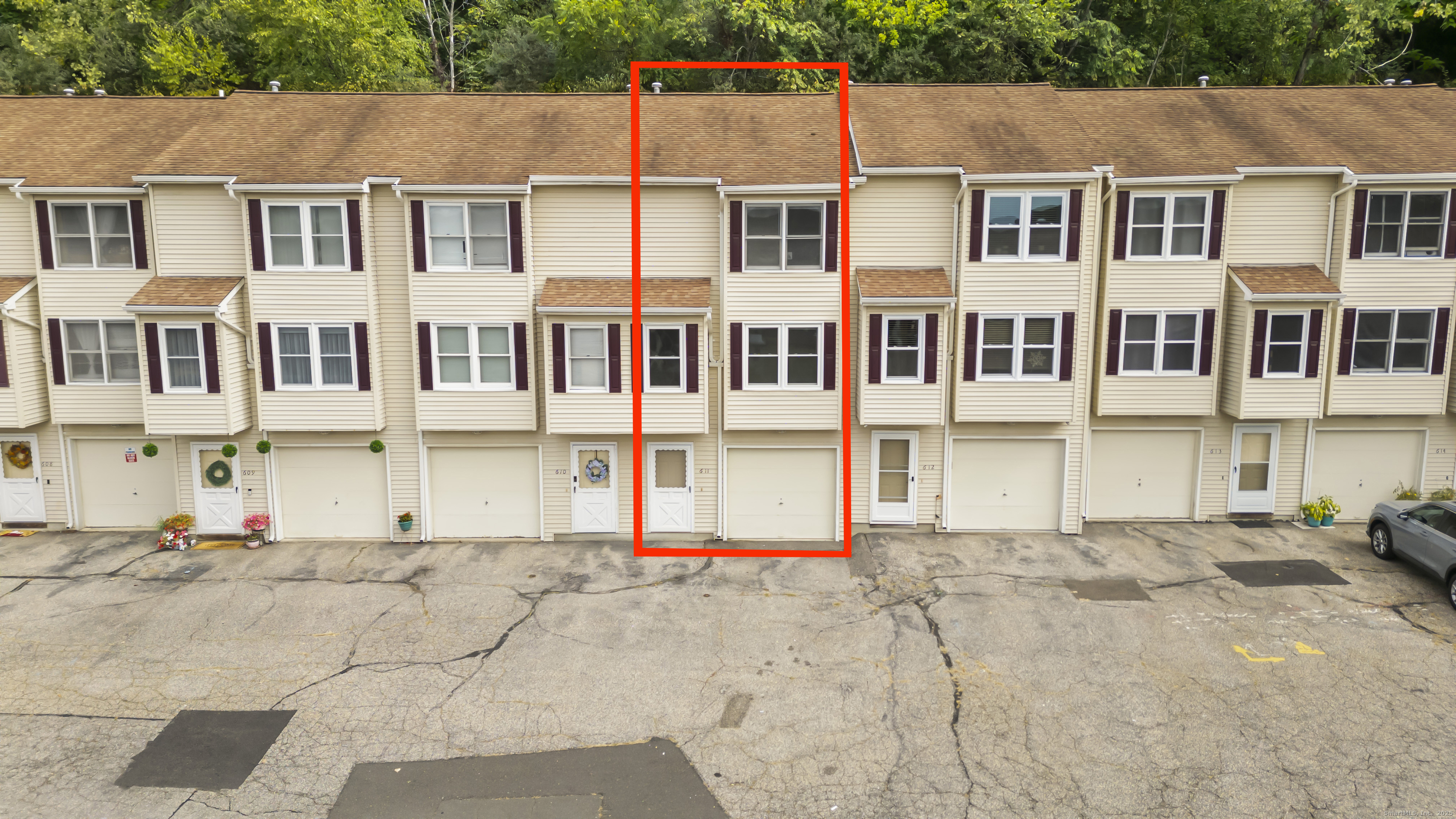 a view of a white building among the street