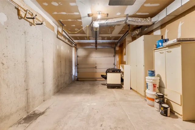 a view of storage and utility room with stairs