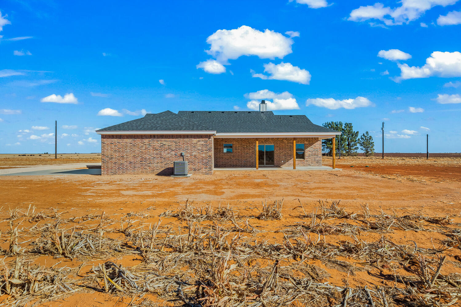 4062 Hawk Road Ropesville, TX 79358 - Photo 39 of 45 a view of a house with a yard