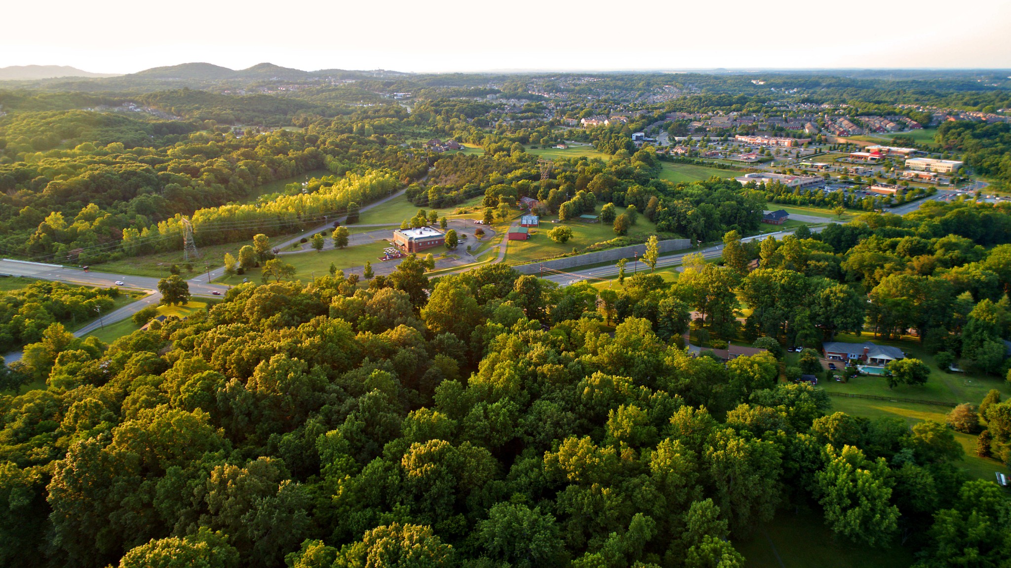 9829 Concord Road Brentwood, TN 37027 - Photo 7 of 15 an aerial view of residential houses with outdoor space and trees