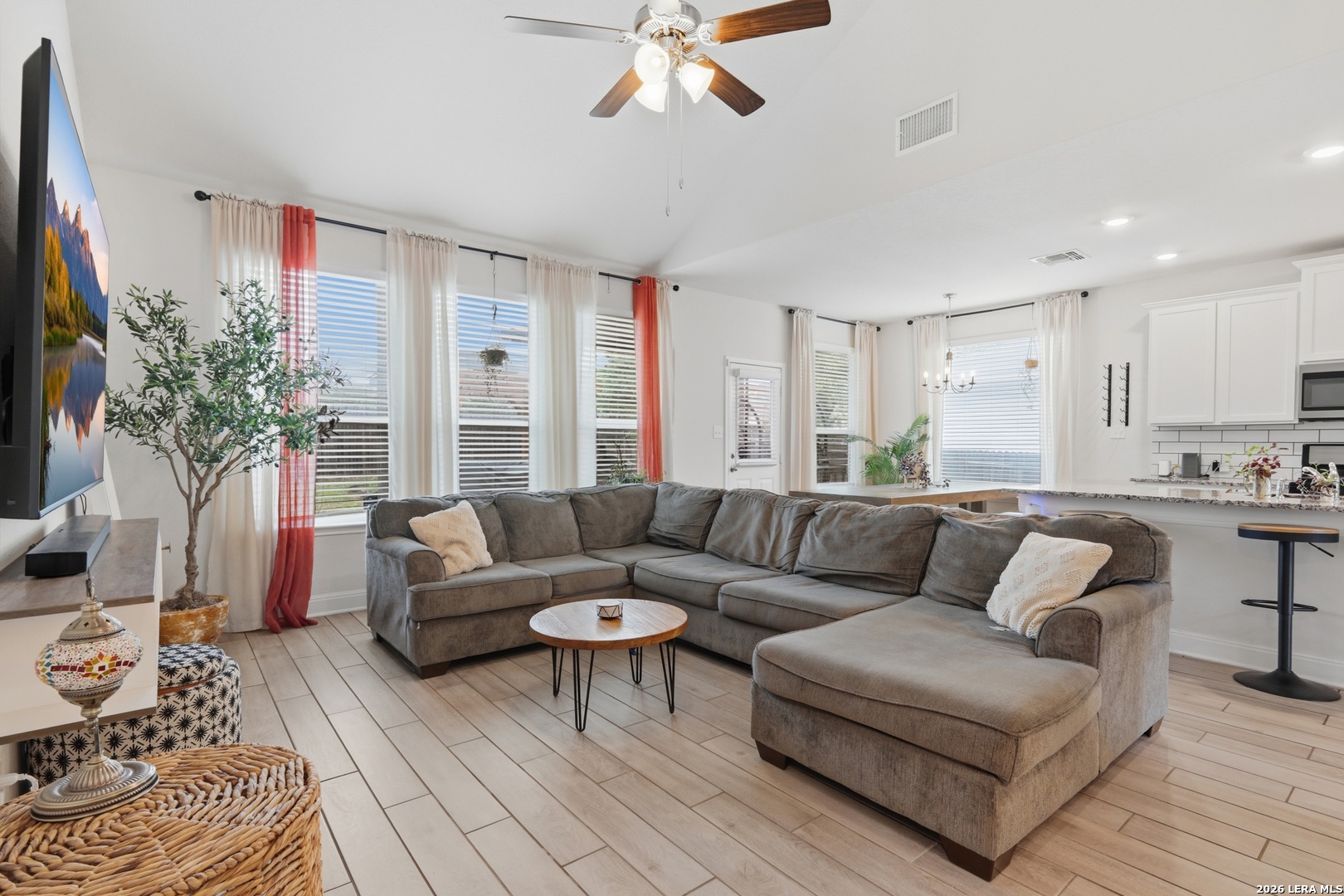3511 Bronzed Copper Bulverde, TX 78163 - Photo 12 of 25 a living room with furniture and a large window