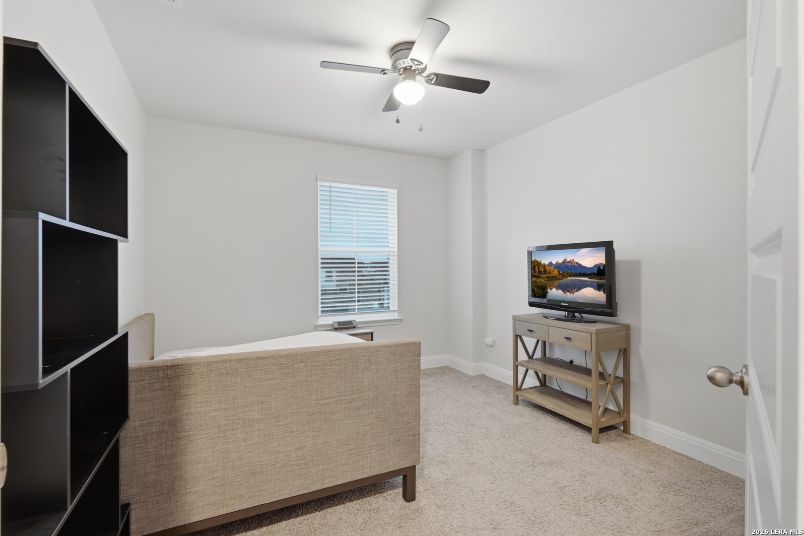 3511 Bronzed Copper Bulverde, TX 78163 - Photo 19 of 25 a living room with furniture and a flat screen tv