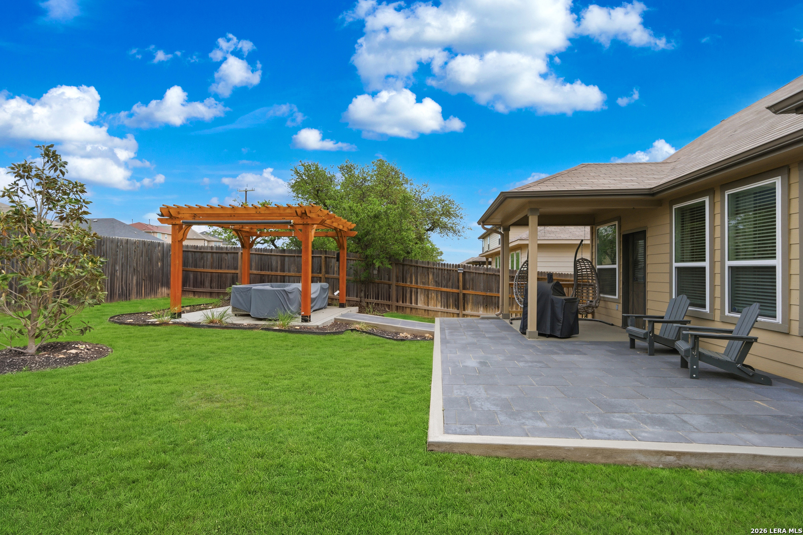 3511 Bronzed Copper Bulverde, TX 78163 - Photo 23 of 25 a view of a house with backyard porch and sitting area
