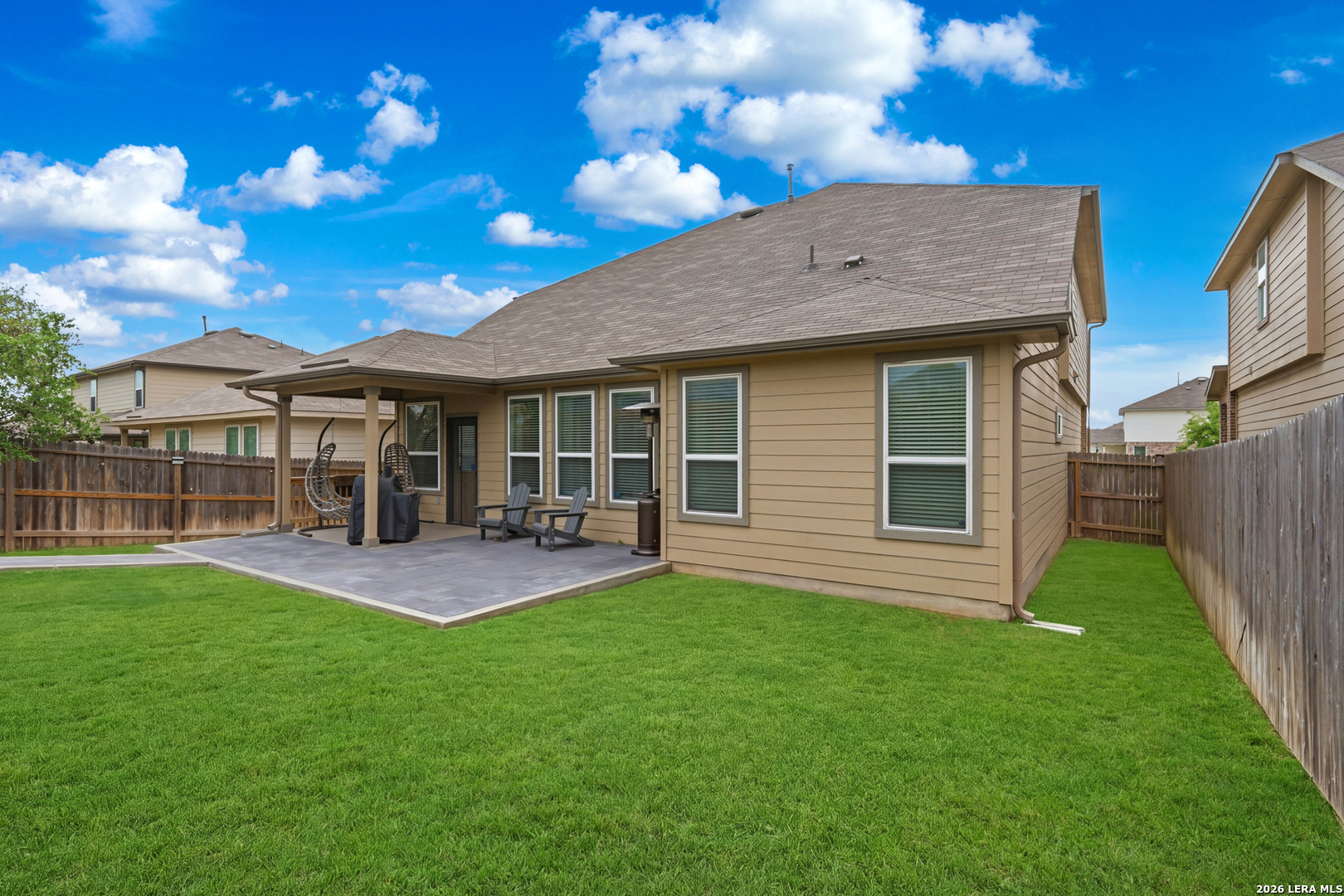 3511 Bronzed Copper Bulverde, TX 78163 - Photo 25 of 25 a front view of house with yard and outdoor seating