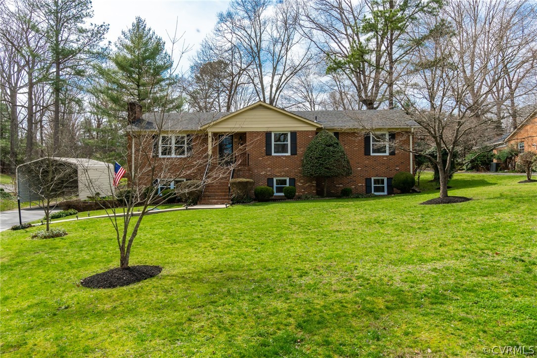 3908 Dunraven Road Chesterfield, VA 23236 - Photo 1 of 44 a front view of a house with a yard