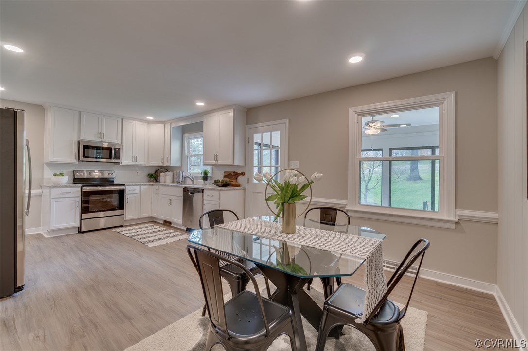 3908 Dunraven Road Chesterfield, VA 23236 - Photo 19 of 44 a view of a dining room with furniture and window