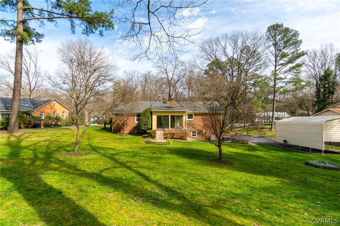 3908 Dunraven Road Chesterfield, VA 23236 - Photo 43 of 44 a view of a house with a big yard