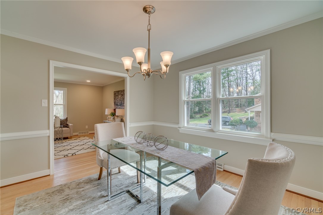 3908 Dunraven Road Chesterfield, VA 23236 - Photo 10 of 44 a view of a dining room with furniture window and outside view
