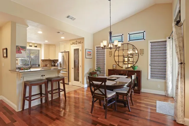 a kitchen with sink cabinets and window