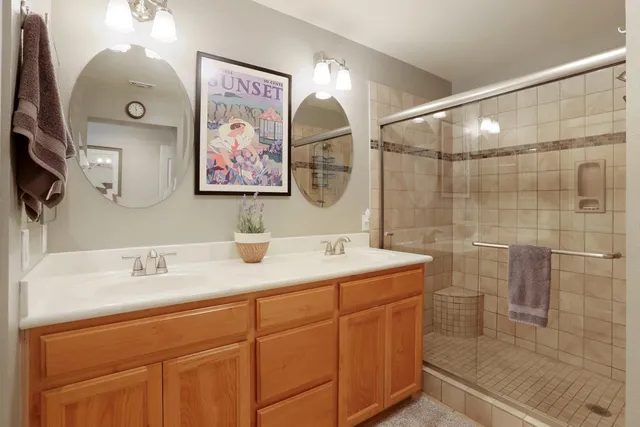 a building outdoor space with patio furniture and potted plants