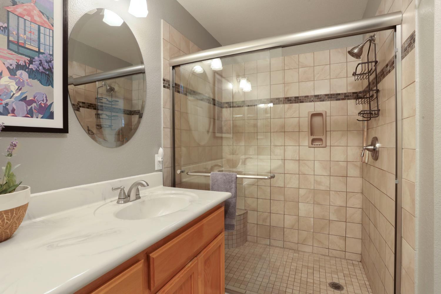 2832 Remington Way Tracy, CA 95377 - Photo 34 of 67 a bathroom with a shower and a sink