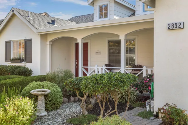 a view of a livingroom with furniture and a workspace