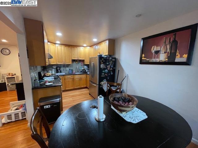 1827 Alemany Boulevard San Francisco, CA 94112 - Photo 6 of 12 a living room with furniture and flat screen tv