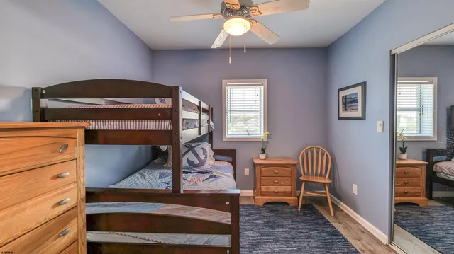 a view of a swimming pool with outdoor seating