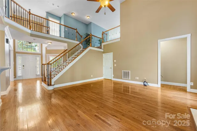 a view of an entryway with wooden floor