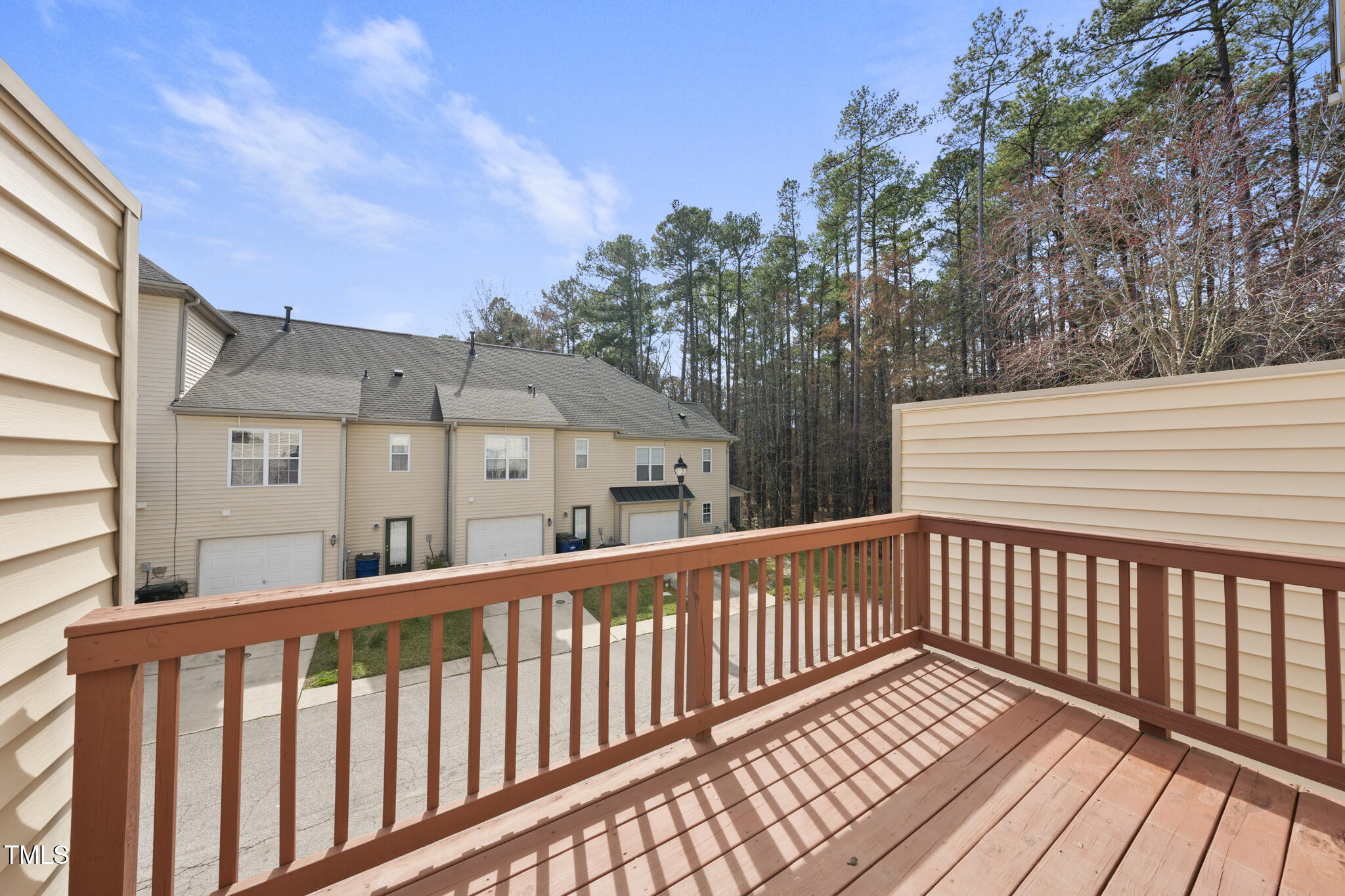 9910 Clyborn Court Raleigh, NC 27617 - Photo 13 of 19 a view of a houses with a roof deck