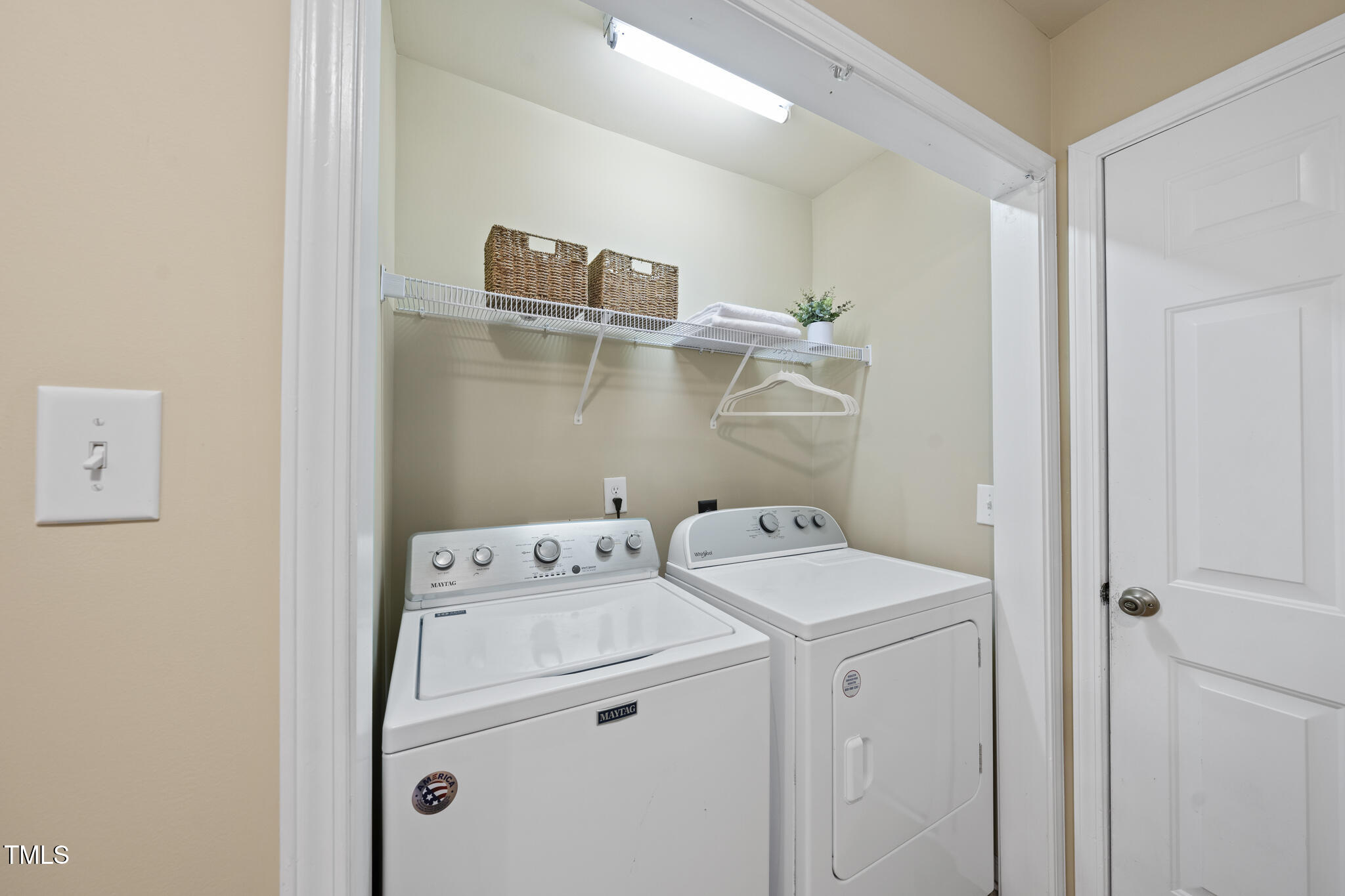 9910 Clyborn Court Raleigh, NC 27617 - Photo 6 of 19 a utility room with dryer and washer