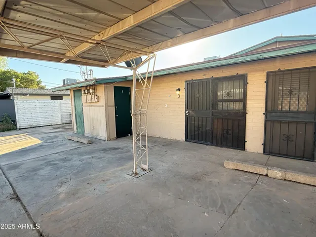a view of a room with wooden walls