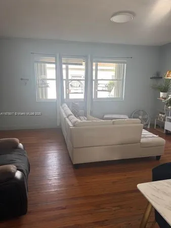 a bed room with a bed and a couch