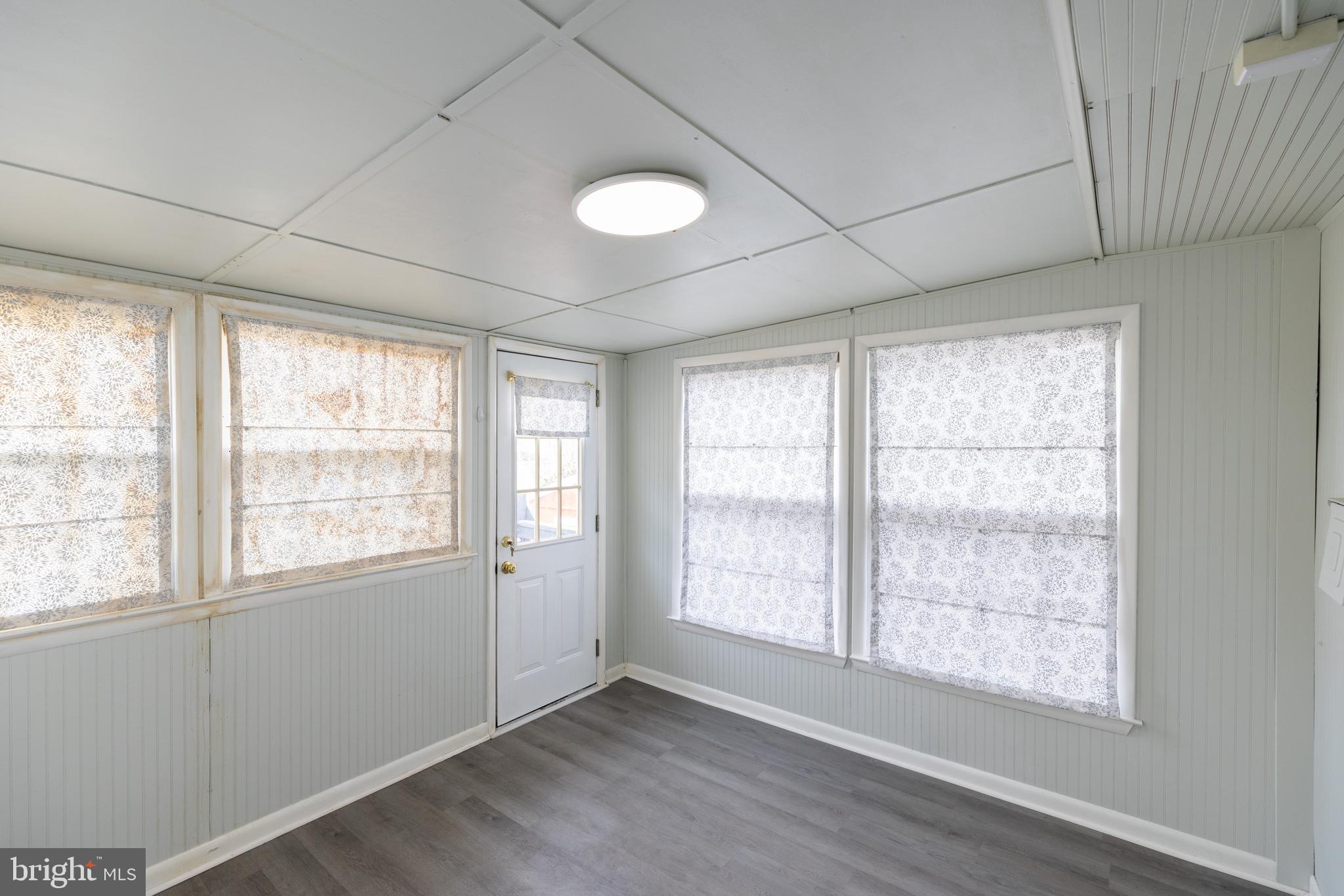 12 Alwyn Road Newark, DE 19713 - Photo 26 of 31 an empty room with wooden floor and windows
