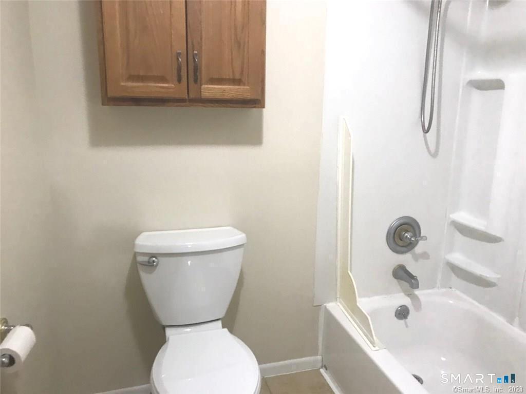5 Nabby Road, Unit A51 Danbury, CT 06811 - Photo 10 of 13 a bathroom with a toilet and a bathtub