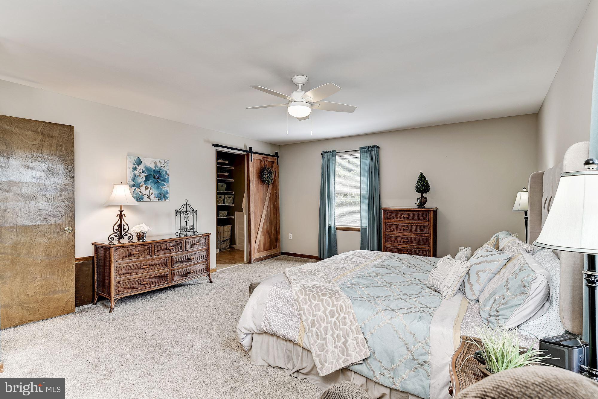 10685 Stansfield Road Laurel, MD 20723 - Photo 14 of 48 Master bedroom with barn door to master bathroom.