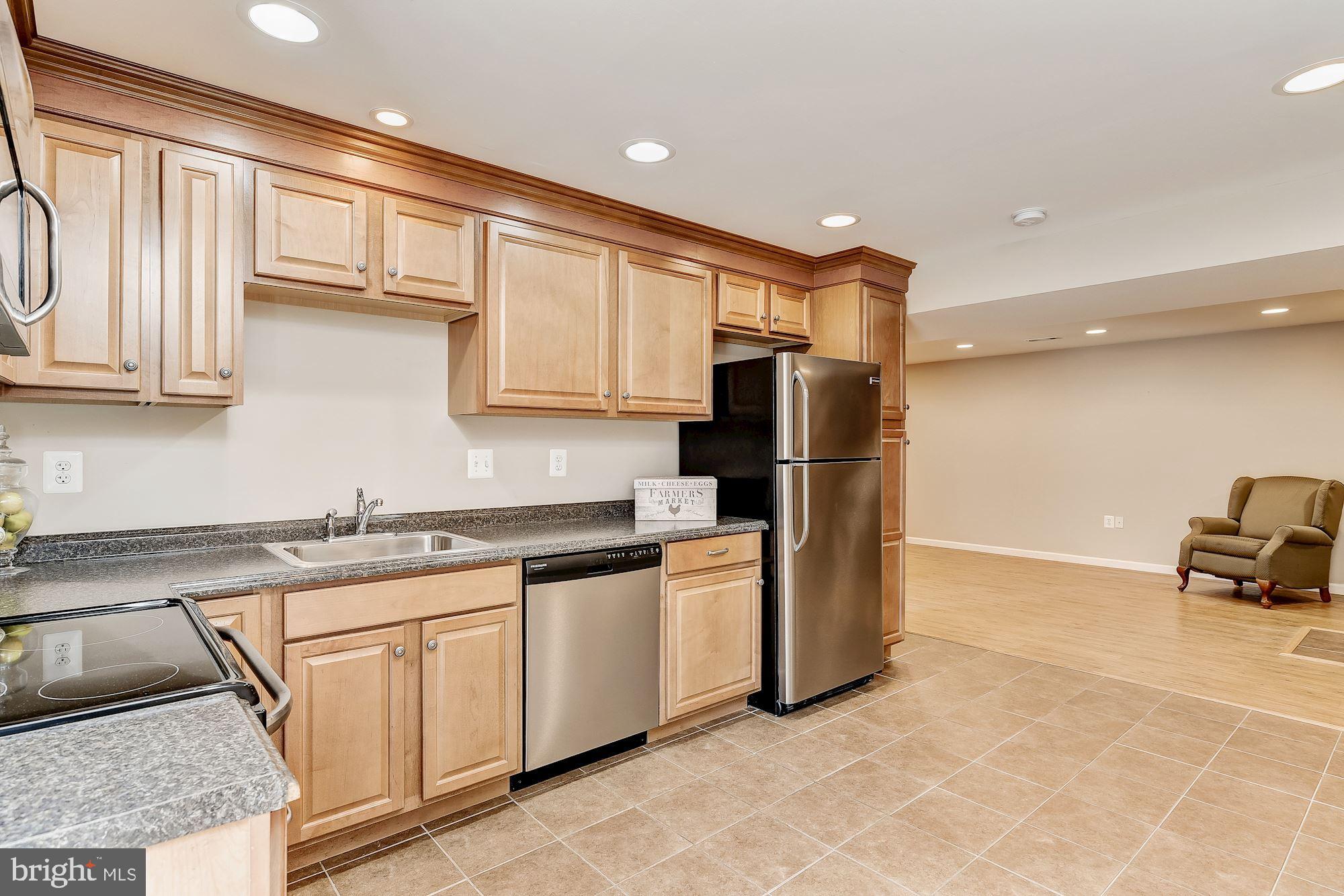 10685 Stansfield Road Laurel, MD 20723 - Photo 25 of 48 In-law suite kitchen, stainless steel appliances.