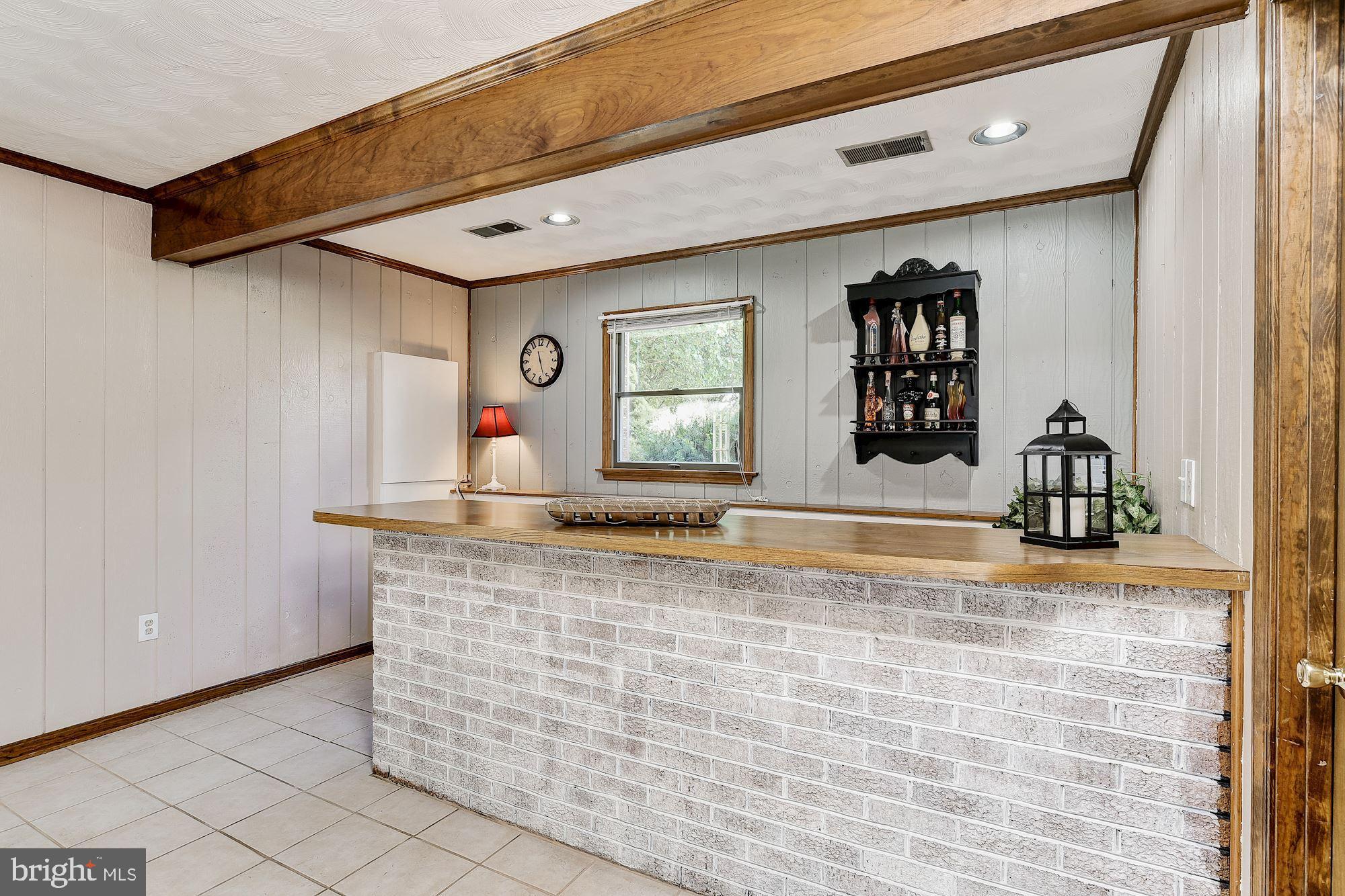 10685 Stansfield Road Laurel, MD 20723 - Photo 30 of 48 Wet bar with seating available.