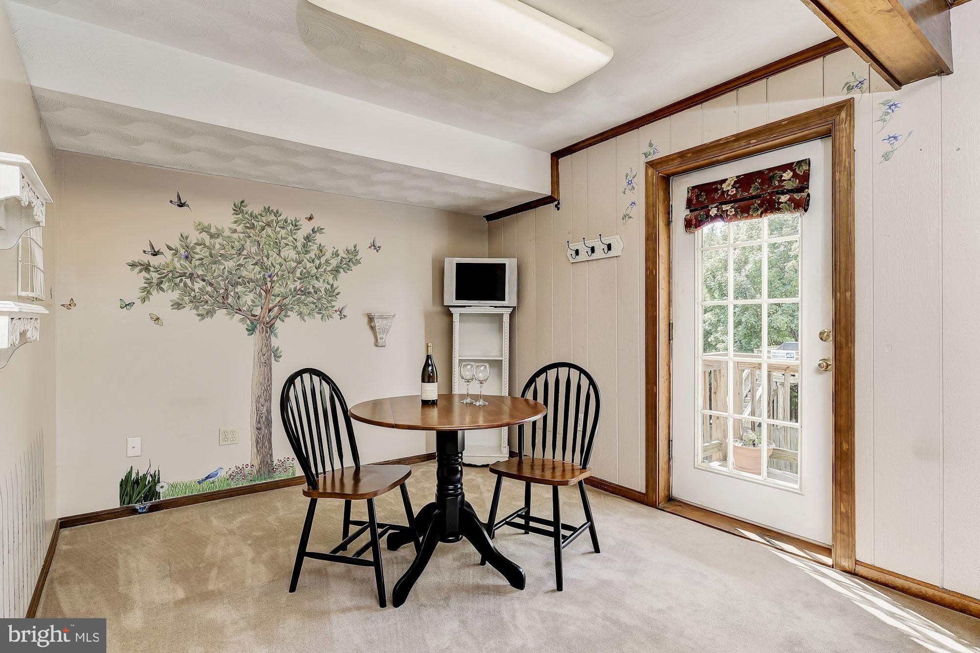 10685 Stansfield Road Laurel, MD 20723 - Photo 31 of 48 Recreation room/den with exposed beams.