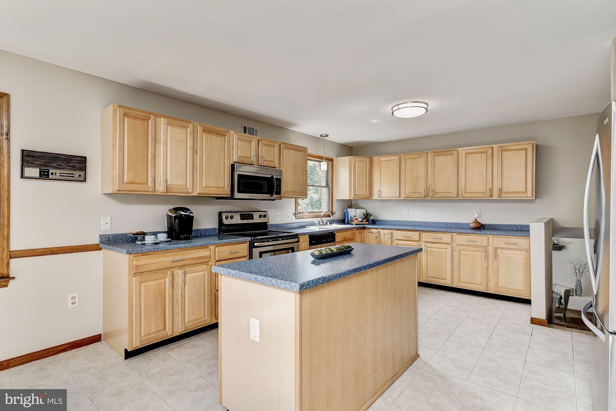 10685 Stansfield Road Laurel, MD 20723 - Photo 6 of 48 Roomy kitchen with lots of storage.