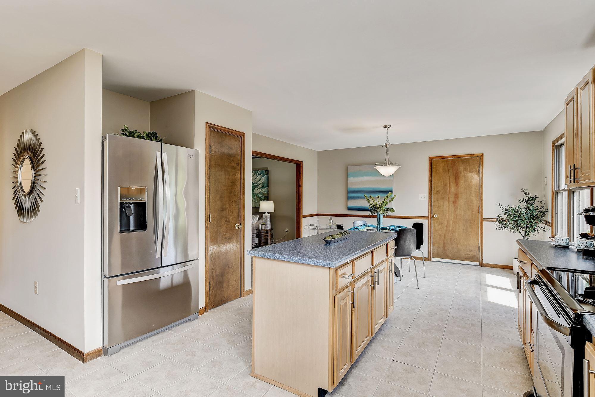 10685 Stansfield Road Laurel, MD 20723 - Photo 8 of 48 Kitchen with stainless steel appliances.