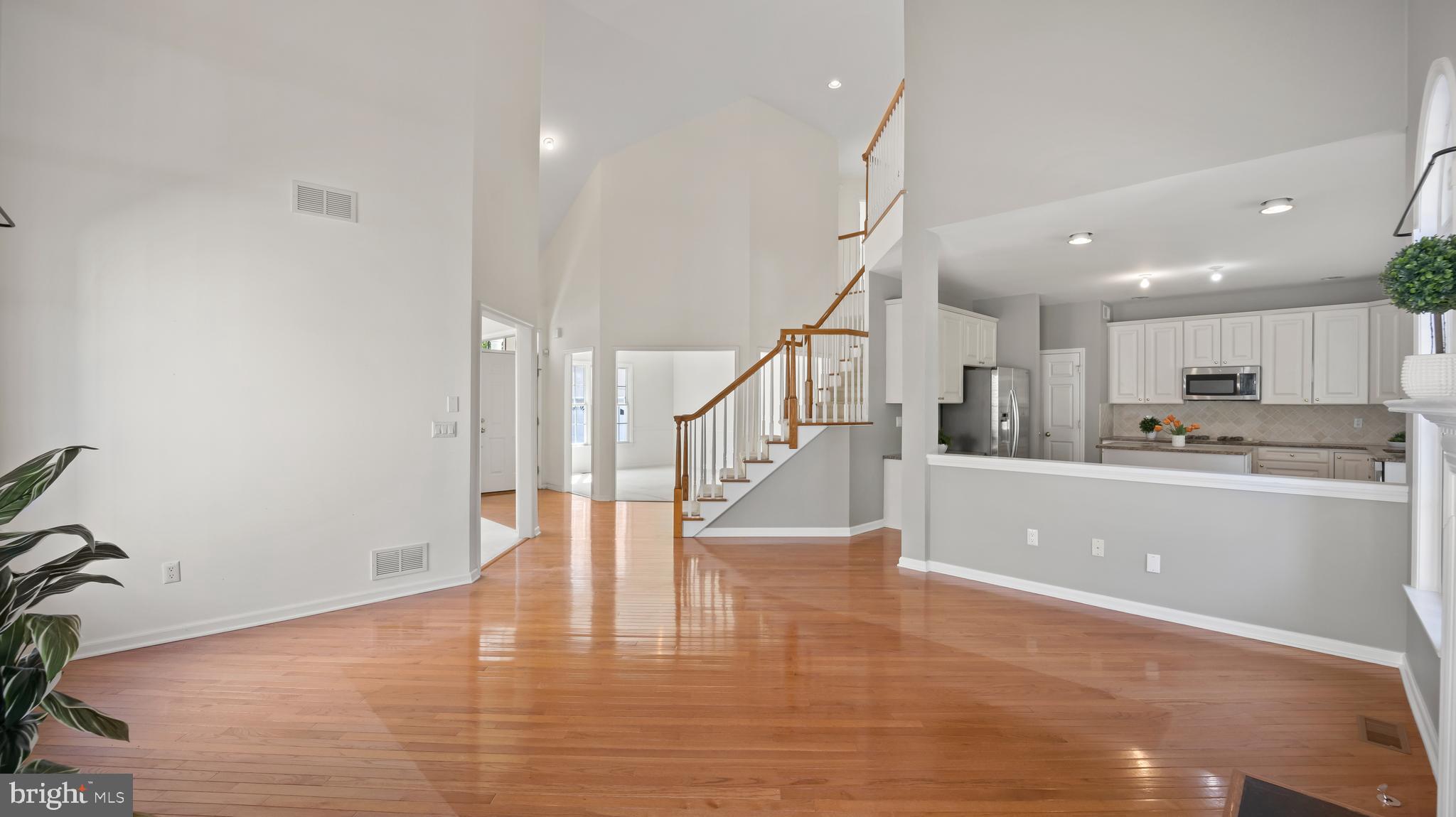 8 Bethpage Drive Skillman, NJ 08558 - Photo 15 of 36 a view of kitchen with wooden floor and electronic appliances