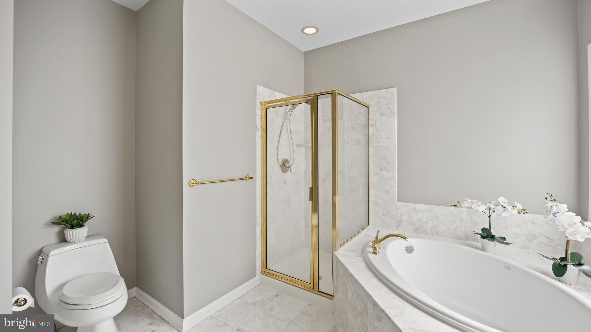 8 Bethpage Drive Skillman, NJ 08558 - Photo 20 of 36 a bathroom with a tub shower sink and mirror